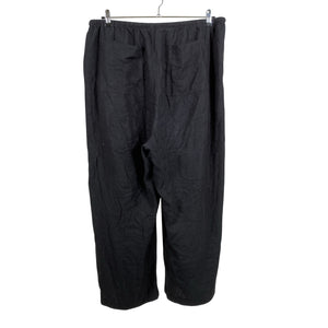 Unisex Marks&Spencer - Mittevenivad püksid, suurus 48 - Must (2)
