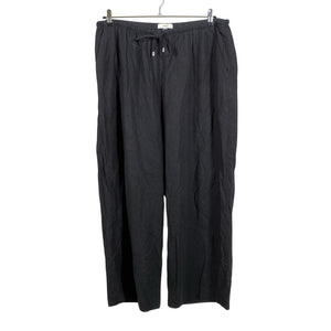 Unisex Marks&Spencer - Mittevenivad püksid, suurus 48 - Must (1)