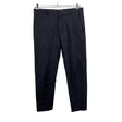 Unisex COS - Mittevenivad püksid, suurus L - Must ()
