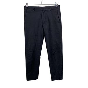 Unisex COS - Mittevenivad püksid, suurus L - Must (1)