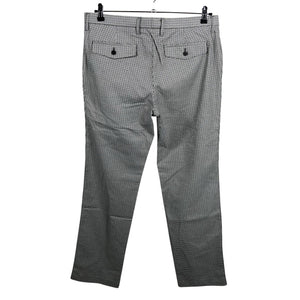 Unisex Uniqlo - Mittevenivad püksid, suurus W36 - Looduslik valge (2)