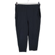 Unisex COS - Mittevenivad püksid, suurus 40 - Must ()