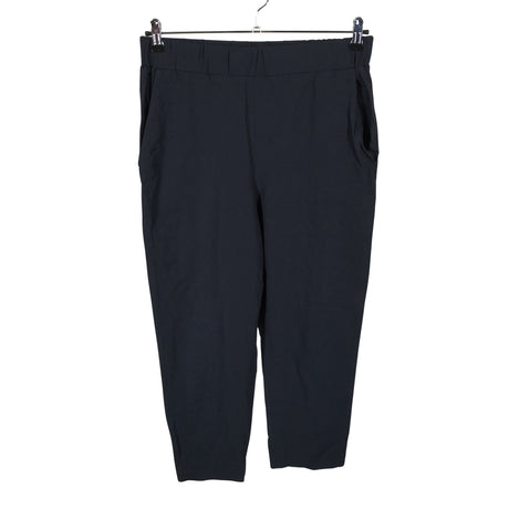 Unisex COS - Mittevenivad püksid, suurus 40 - Must ()
