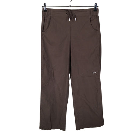 Unisex Nike - Mittevenivad püksid, suurus 38 - Pruun ()