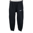 Unisex Nike - Dressikangast püksid, suurus 128 - 134 - Must ()