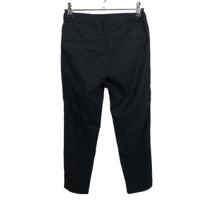 Unisex Lindex - Mittevenivad püksid, suurus 134 - 140 - Must (2)