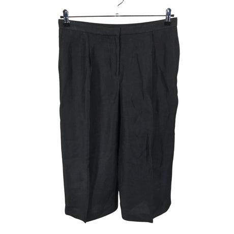 Unisex COS - Mittevenivad püksid, suurus 36 - Must ()