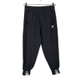 Unisex Adidas - Dressikangast püksid, suurus 38 - Must ()