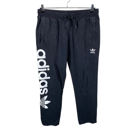 Unisex Adidas - Dressikangast püksid, suurus M - Must ()