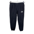 Unisex New Balance - Dressikangast püksid, suurus 152 - 158 - Must ()