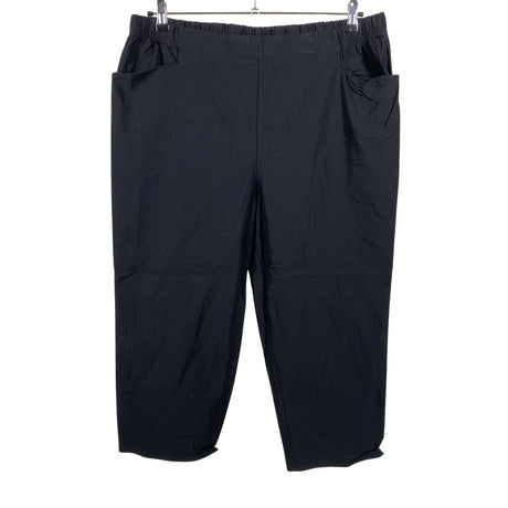 Unisex Kaija S. - Mittevenivad poolpikad püksid, suurus 50 - Must ()