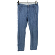 Unisex Lindex - Mittevenivad püksid, suurus 122 - 128 - Helesinine ()