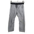 Unisex Next - Mittevenivad püksid, suurus 104 - 110 - Hall ()