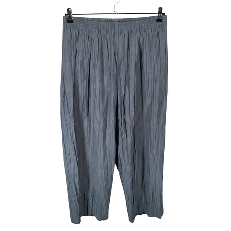 Unisex COS - Mittevenivad püksid, suurus 36 - Sinine ()