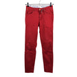 Unisex Holly & Whyte by Lindex - Mittevenivad püksid, suurus 38 - Punane ()