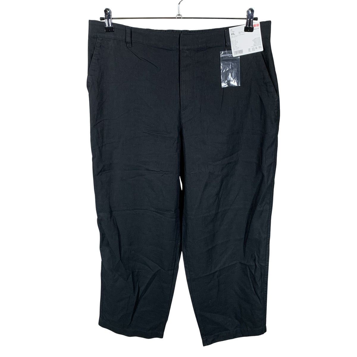 Unisex Uniqlo - Mittevenivad püksid, suurus 44 - Must (1)