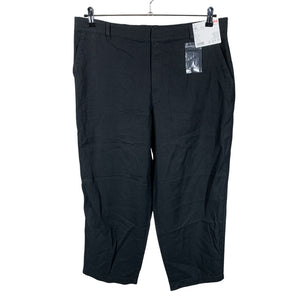 Unisex Uniqlo - Mittevenivad püksid, suurus 44 - Must (1)