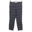 Unisex Cut & Pret - Mittevenivad püksid, suurus 34 - Must ()