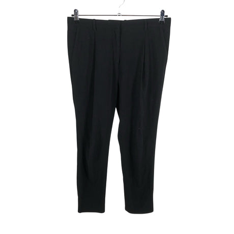 Unisex COS - Mittevenivad püksid, suurus 38 - Must ()