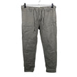 Unisex East West - Mittevenivad püksid, suurus W34 - Pruun ()