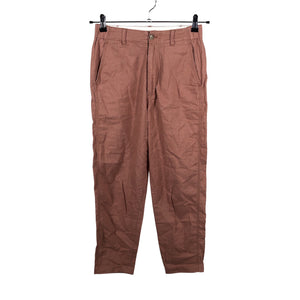 Unisex Uniqlo - Mittevenivad püksid, suurus 34 - Heleroosa (1)