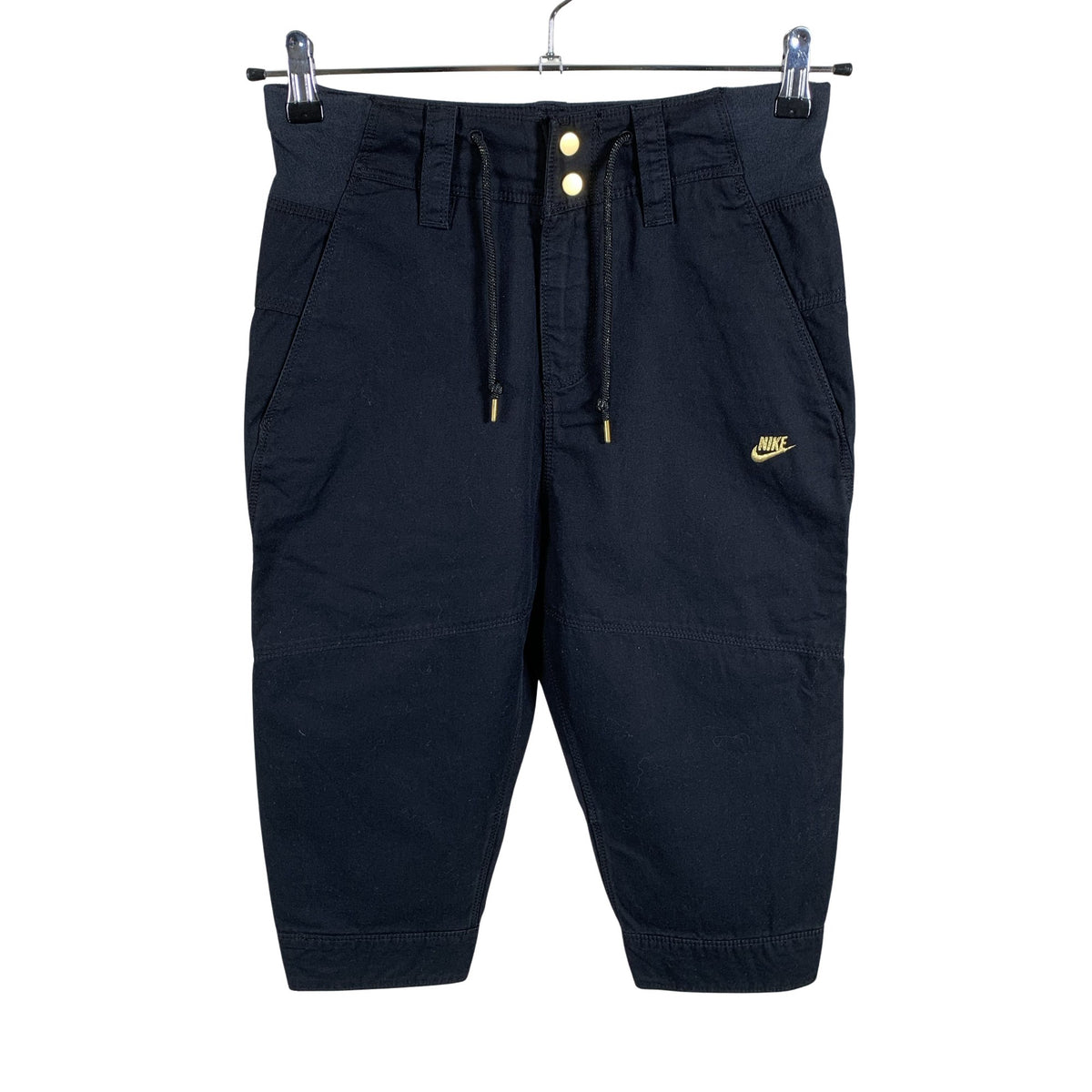 Unisex Nike - Mittevenivad poolpikad püksid, suurus 34 - Must (1)