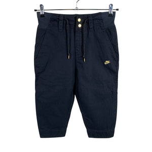 Unisex Nike - Mittevenivad poolpikad püksid, suurus 34 - Must (1)