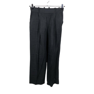 Unisex COS - Mittevenivad püksid, suurus 36 - Must (1)