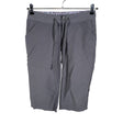 Unisex Columbia - Mittevenivad poolpikad püksid, suurus 34 - Hall ()