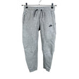 Unisex Nike - Dressikangast püksid, suurus 152 - 158 - Hall ()