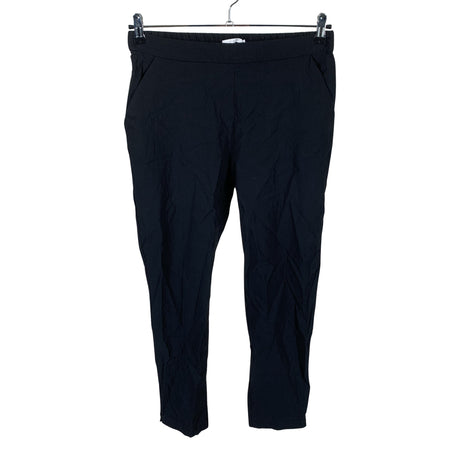 Unisex O.I.S - Mittevenivad püksid, suurus 38 - Must ()