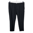 Unisex Filippa K. - Mittevenivad püksid, suurus 52 - Must ()