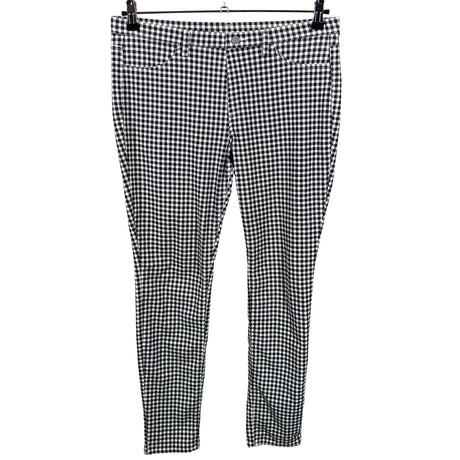 Unisex Uniqlo - Mittevenivad püksid, suurus 42 - Must ()